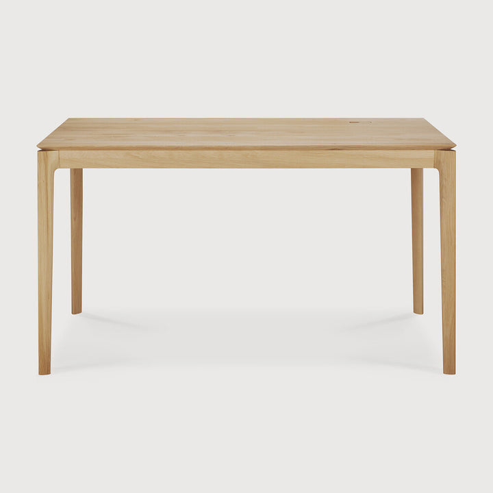 The Bok Desk by Ethnicraft features varnished oak, 140cm