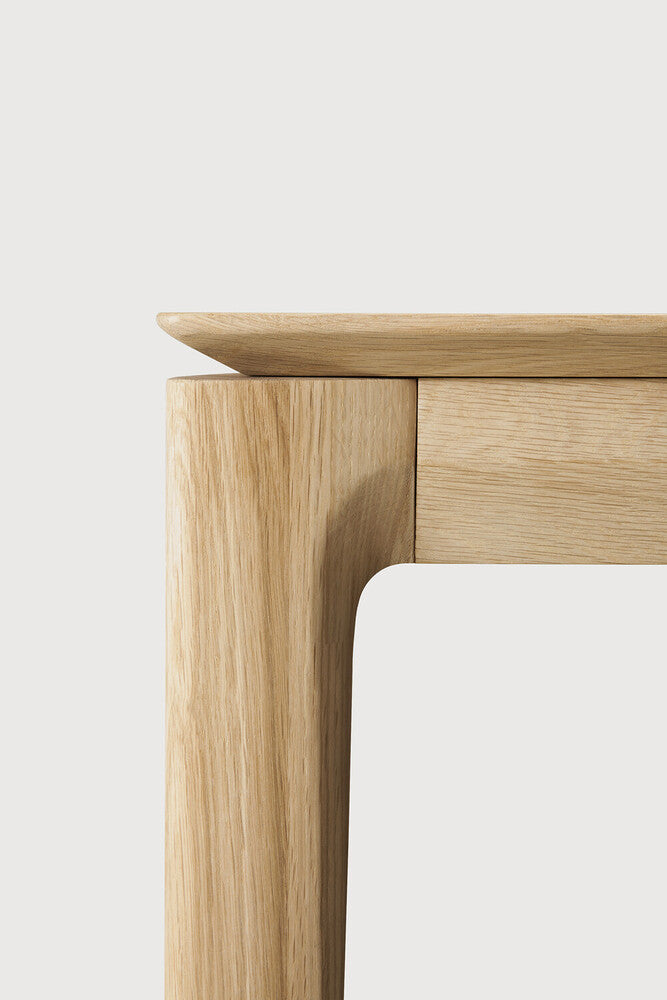 The Bok Desk by Ethnicraft features varnished oak, leg